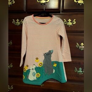 Cute pink white striped dress with appliqué on front in size 7.